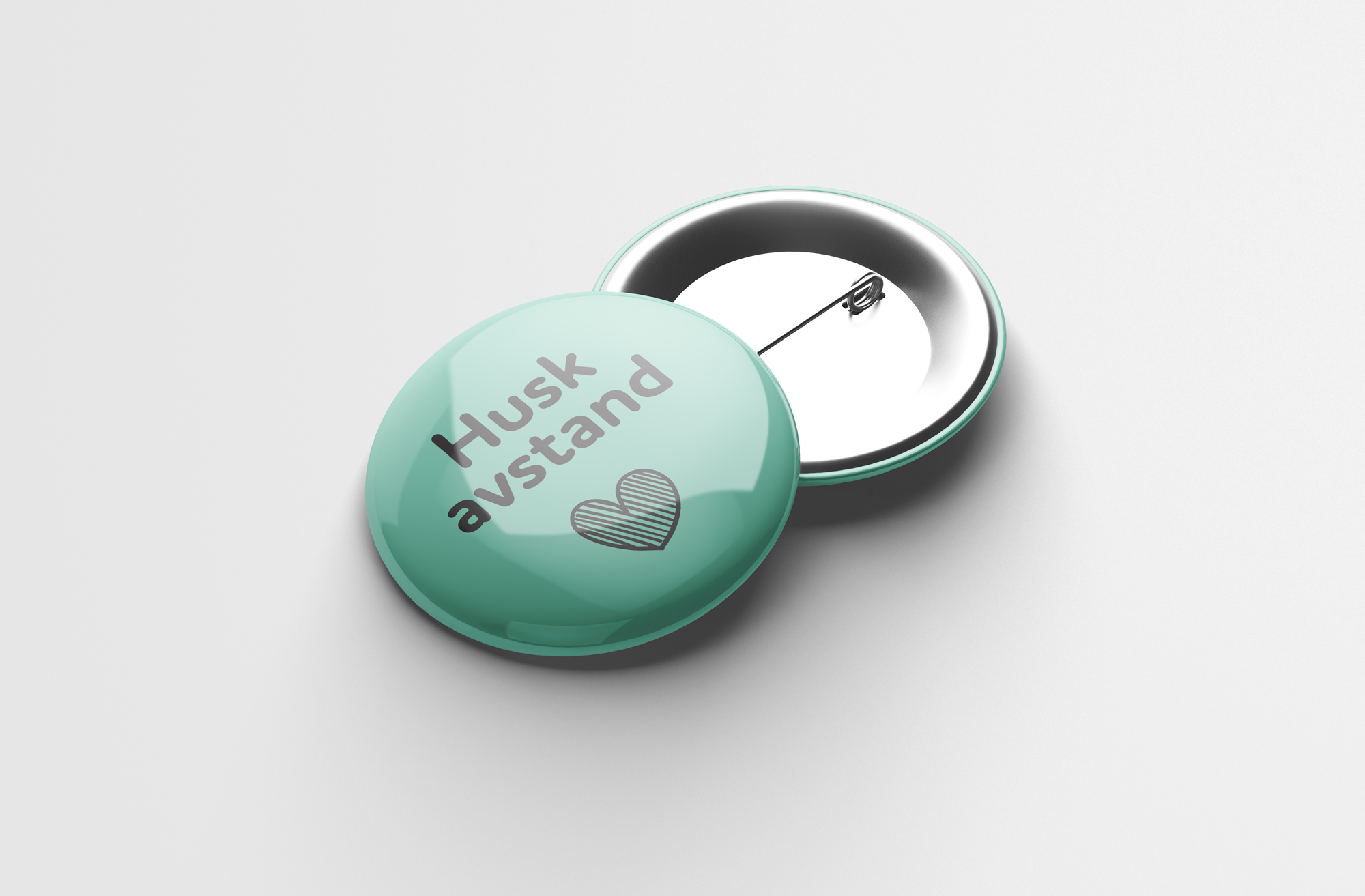 Grønn button med teksten hold avstand, og et hjerte.