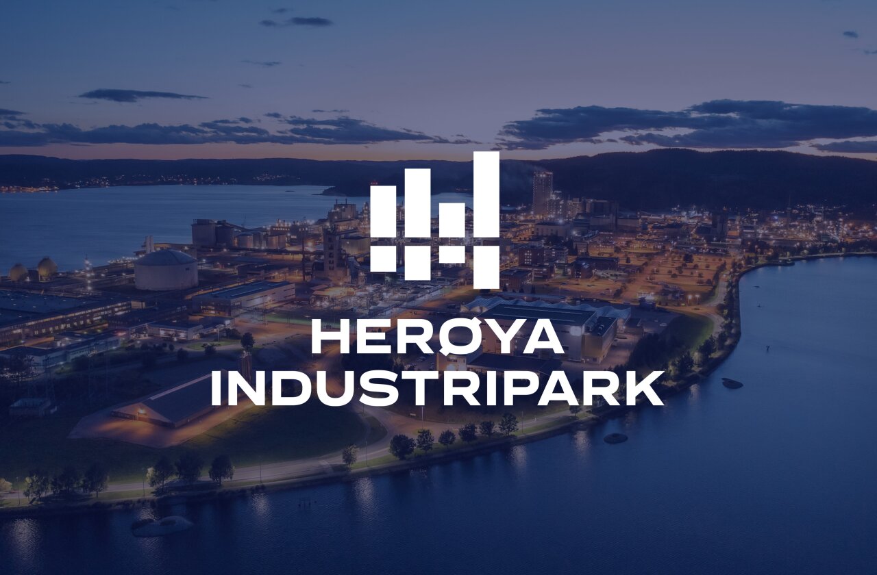 Ny logo med foto av Herøya i bakgrunnen.